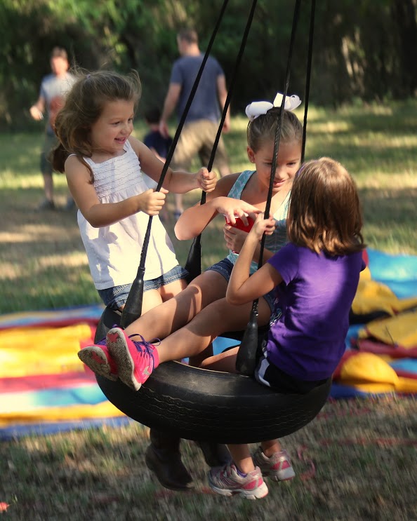 kids on tire swing